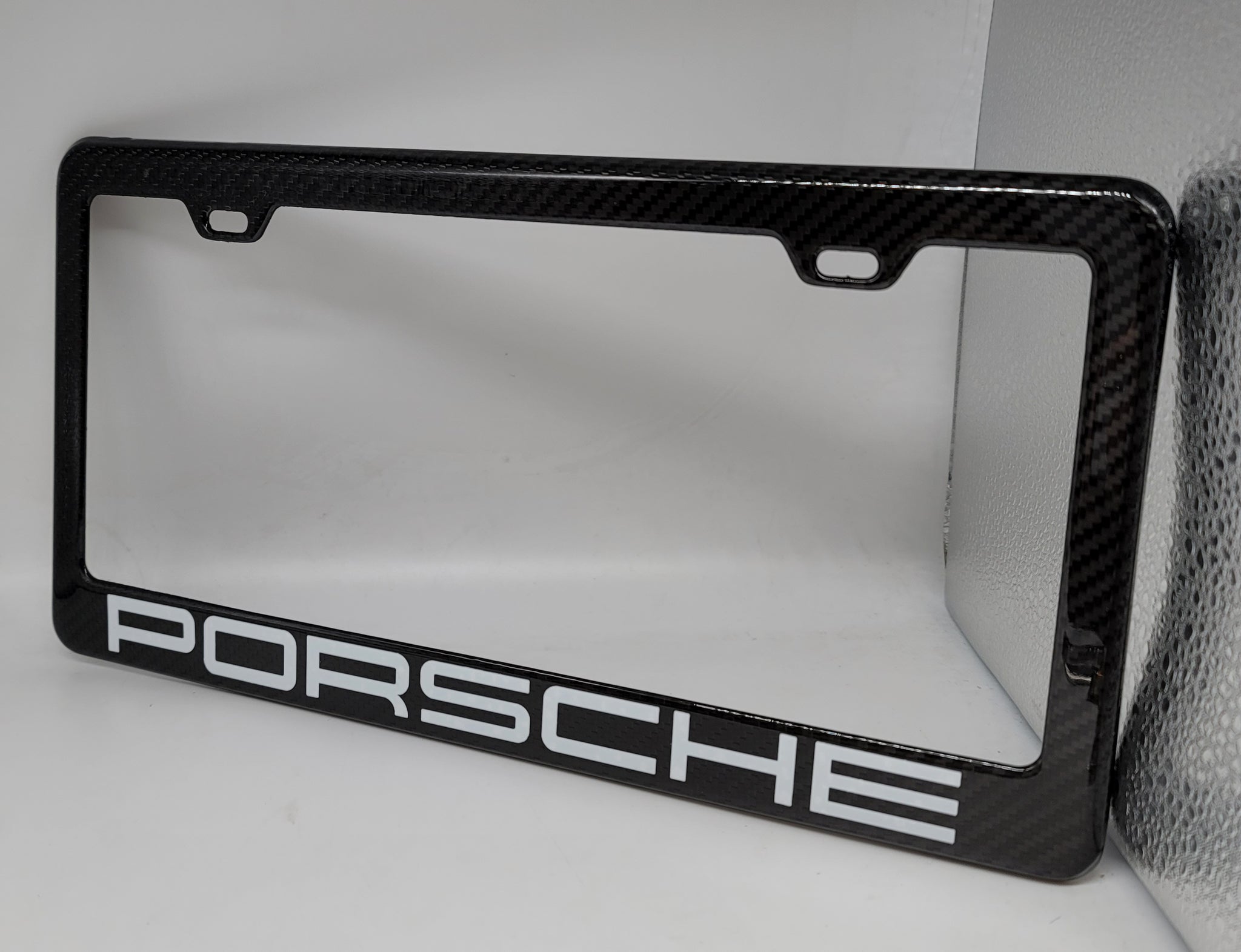 Black porsche deals license plate frame